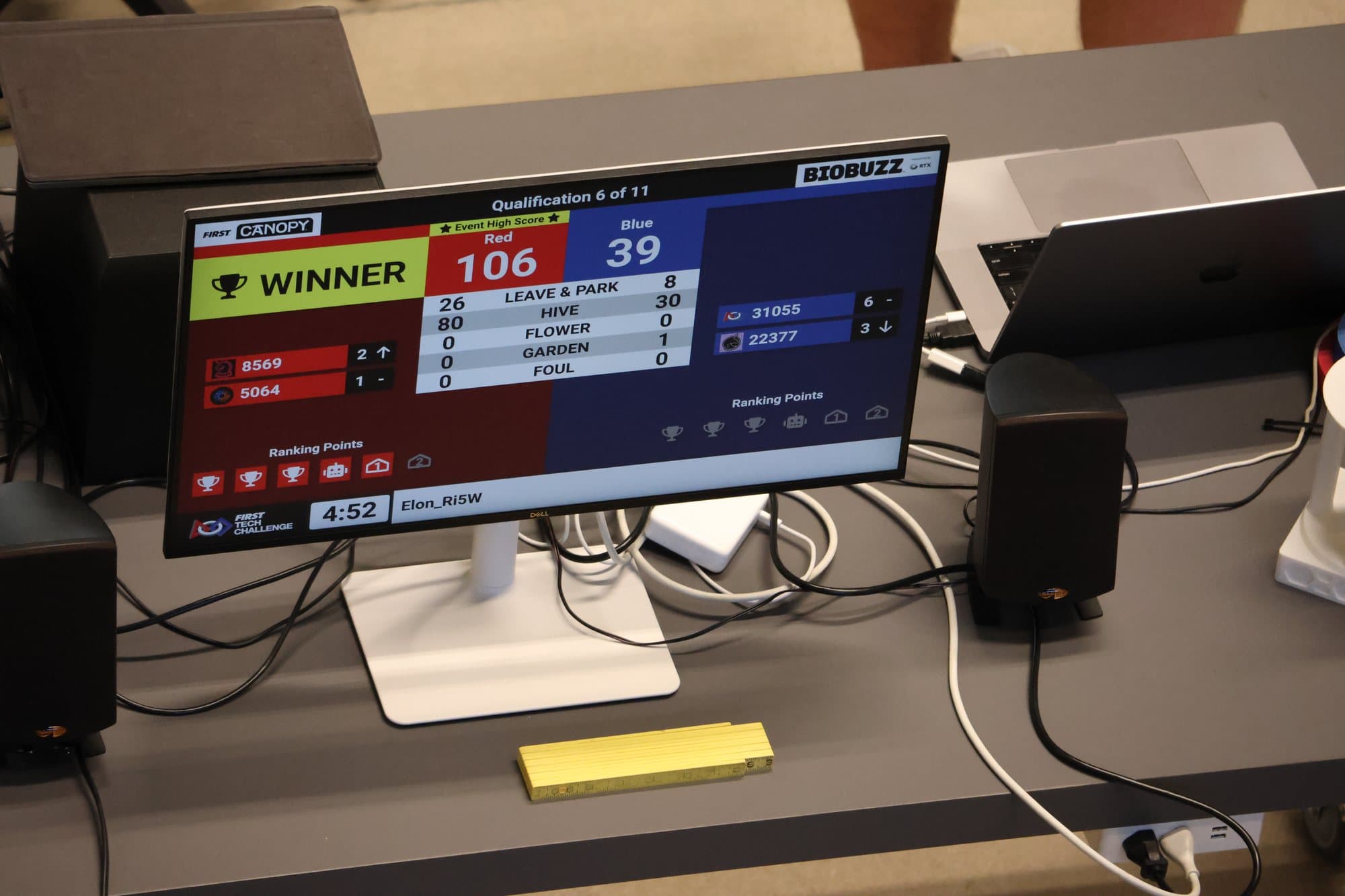 Scoreboard showing the red alliance of 8569 and 5064 winning 106 to 39, marked event high score